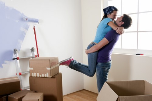 Apartment moving team working through stairs and tight access in Belmont