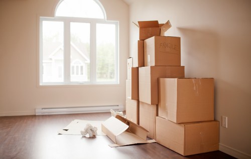 Furniture and boxes being loaded for a Belmont removals job