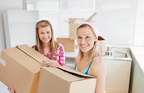 Furniture and household items being moved in Belmont